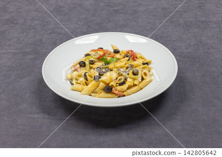 delicious and hot pasta on plate 142805642