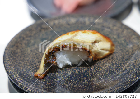 Japan April 29 2026 Seared fatty fish nigiri sushi closeup Japan April 29 2026 Seared fatty fish nigiri sushi closeup 142805728