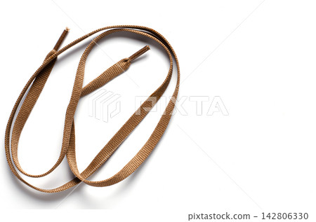 Shoelace on a white background. Copy space Shoelace on a white background. Copy space 142806330
