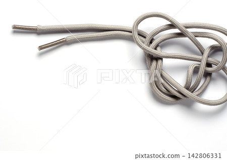 Shoelace on a white background. Copy space Shoelace on a white background. Copy space 142806331