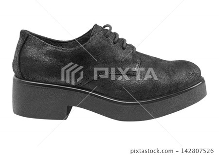 Black textured leather women derby shoe on thick platform isolated on white background Black textured leather women derby shoe on thick platform isolated on white background 142807526