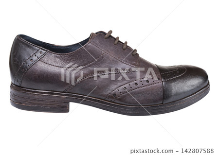 Dark brown burnished leather women brogue shoes side view isolated on white background Dark brown burnished leather women brogue shoes side view isolated on white background 142807588