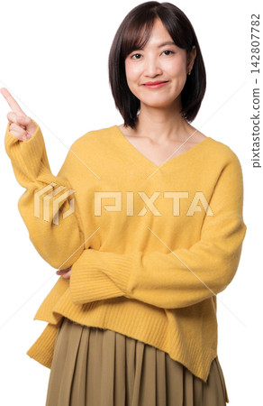 Happy smiling young asian woman pointing finger up presenting artificial intelligence chatbot technology solution isolated on transparency background clearly 142807782