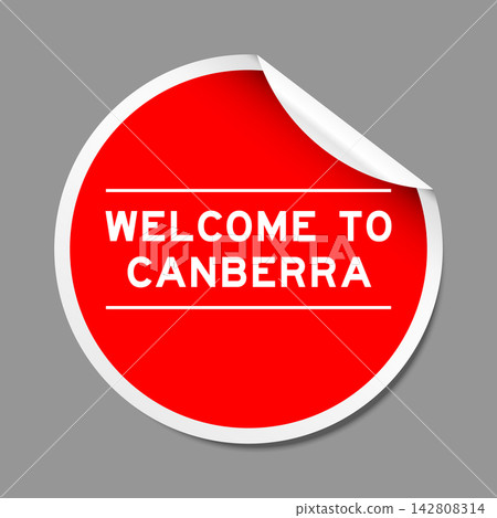 Red color peel sticker label with word welcome to canberra on gray background 142808314