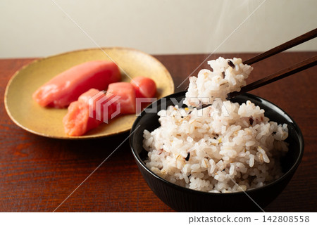 A Japanese meal of five-grain rice and cod roe. A Japanese meal of five-grain rice and cod roe. 142808558