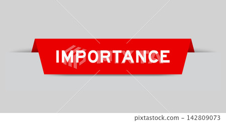 Red color inserted label with word importance on gray background Red color inserted label with word importance on gray background 142809073