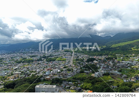 An aerial photograph capturing the city and mountain range of Beppu, Oita Prefecture. An aerial photograph capturing the city and mountain range of Beppu, Oita Prefecture. 142809764