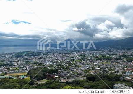 Aerial photograph overlooking the city and bay of Beppu, Oita Prefecture. Aerial photograph overlooking the city and bay of Beppu, Oita Prefecture. 142809765