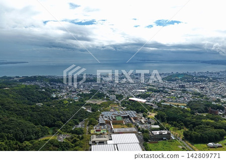 Aerial photograph capturing the coastal town and harbor of Beppu City, Oita Prefecture. Aerial photograph capturing the coastal town and harbor of Beppu City, Oita Prefecture. 142809771