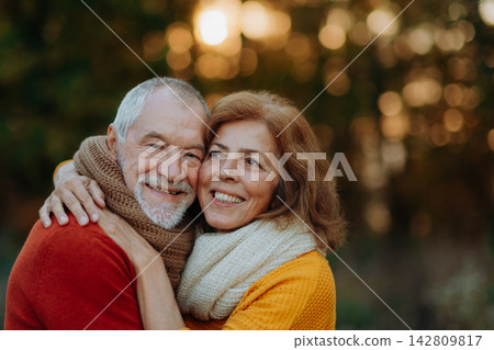 Portrait of senior couple in autumn nature. Portrait of senior couple in autumn nature. 142809817