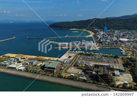 Aerial photograph capturing the port and coastal town of Sumoto City, Hyogo Prefecture. Aerial photograph capturing the port and coastal town of Sumoto City, Hyogo Prefecture. 142809997