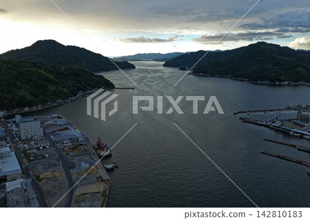 Aerial photograph capturing the port and industrial area of Uwajima City, Ehime Prefecture. Aerial photograph capturing the port and industrial area of Uwajima City, Ehime Prefecture. 142810183