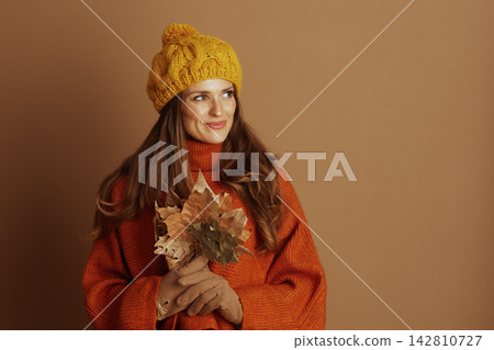 Middle-Aged Woman in Beret, Gentle Autumn Smile Middle-Aged Woman in Beret, Gentle Autumn Smile 142810727