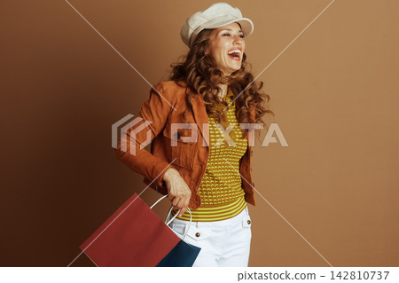 Joyful Shopper in Autumn Colors Joyful Shopper in Autumn Colors 142810737