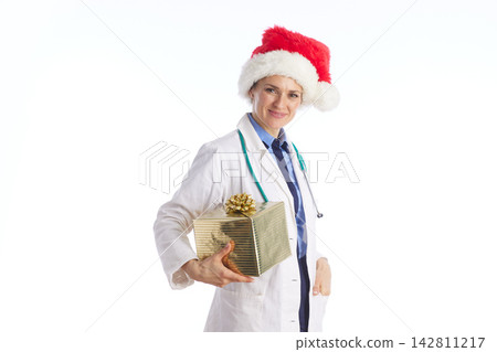 Medical Professional Offering Gold Christmas Gift Medical Professional Offering Gold Christmas Gift 142811217