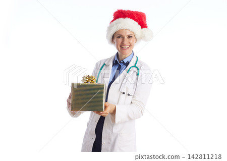 Female Doctor Presenting Gift to Camera Female Doctor Presenting Gift to Camera 142811218