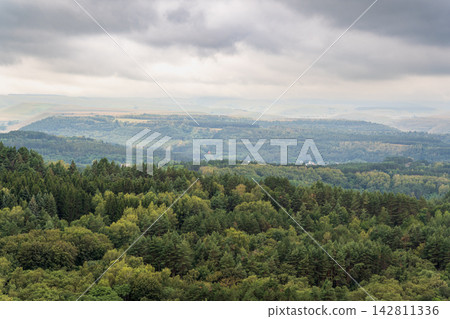 Layers of green mountains and hills in the haze during sunset. Panoramic View of Green hills and Meadow. Layers of green mountains and hills in the haze during sunset. Panoramic View of Green hills and Meadow. 142811336