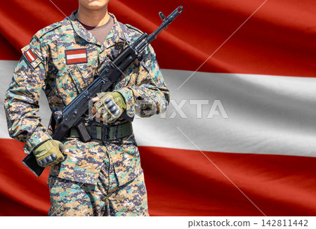 Austria flag with soldier holding assault rifle Austria flag with soldier holding assault rifle 142811442