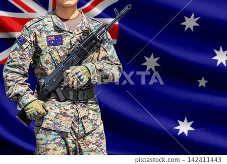 Australia flag with soldier holding assault rifle Australia flag with soldier holding assault rifle 142811443