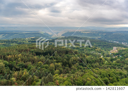 Layers of green mountains and hills in the haze during sunset. Panoramic View of Green hills and Meadow. Layers of green mountains and hills in the haze during sunset. Panoramic View of Green hills and Meadow. 142811607