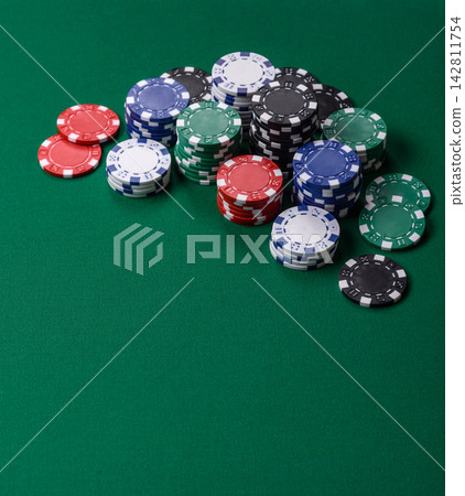 Multi colored gaming chips for betting in casino games. Betting chips Multi colored gaming chips for betting in casino games. Betting chips 142811754