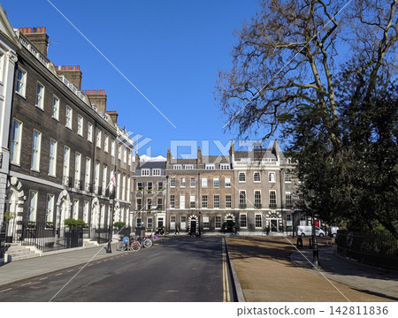 A street lined with historic buildings in London, England 142811836