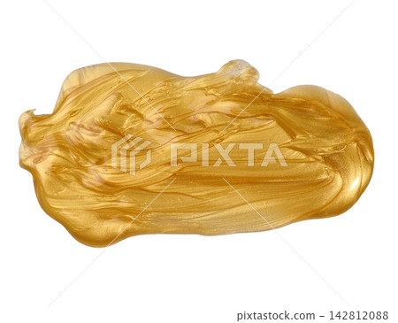 A smear of thick gold metallic paint or gel on an isolated background A smear of thick gold metallic paint or gel on an isolated background 142812088