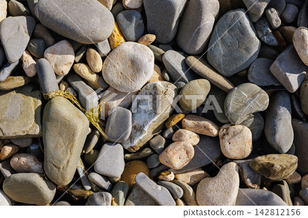 Smooth Coastal Pebbles And Natural Beach Stone Texture Smooth Coastal Pebbles And Natural Beach Stone Texture 142812156
