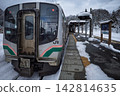 E721 series local train waiting to depart at Yamadera Station in winter. 142814635