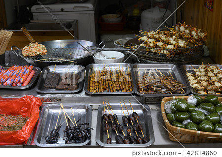 Chinese national delicacies in a street stall in Fenghuang, China Chinese national delicacies in a street stall in Fenghuang, China 142814860