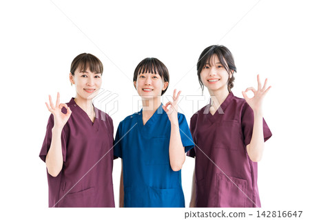 Female staff of doctors, physicians, nurses, medical professionals, doctors, occupational therapists and physical therapists wearing scrubs Female staff of doctors, physicians, nurses, medical professionals, doctors, occupational therapists and physical therapists wearing scrubs 142816647