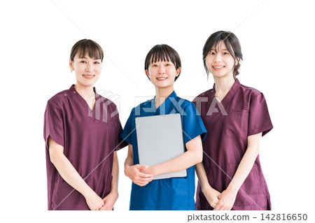 Female staff of doctors, physicians, nurses, medical professionals, doctors, occupational therapists and physical therapists wearing scrubs Female staff of doctors, physicians, nurses, medical professionals, doctors, occupational therapists and physical therapists wearing scrubs 142816650