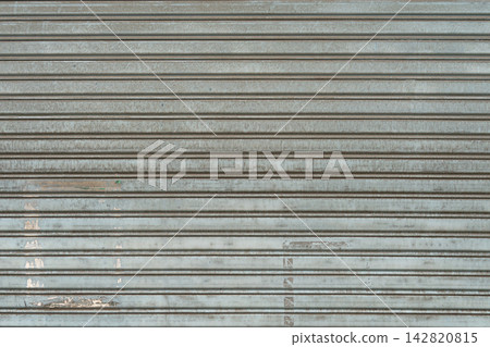 Weathered metal roller shutter door texture horizontal lines surface Weathered metal roller shutter door texture horizontal lines surface 142820815