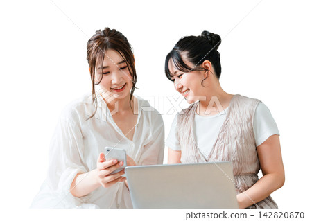 Women, friends, moms, and colleagues who use smartphones and laptops together. Women, friends, moms, and colleagues who use smartphones and laptops together. 142820870
