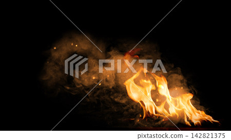 Vibrant fire flames with smoke and glowing sparks against a dark black background, ideal for overlay effects. Fire background Vibrant fire flames with smoke and glowing sparks against a dark black background, ideal for overlay effects. Fire background 142821375