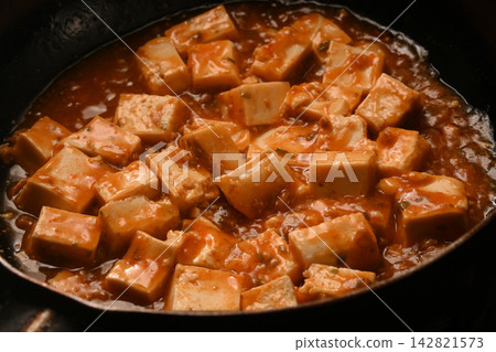 Mapo tofu being cooked Mapo tofu being cooked 142821573