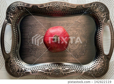 Juicy, red pomegranate seeds bursting with flavor and antioxidants, perfect for snacking or adding a fresh, tangy touch to salads, smoothies, and desserts. Juicy, red pomegranate seeds bursting with flavor and antioxidants, perfect for snacking or adding a fresh, tangy touch to salads, smoothies, and desserts. 142822119