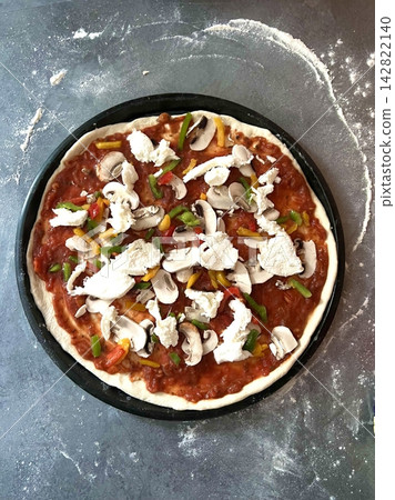 A delicious pizza with a golden crust, melted cheese, and savory toppings. Perfect for food-related designs, menus, or Italian-themed projects, capturing the essence of a classic comfort dish. A delicious pizza with a golden crust, melted cheese, and savory toppings. Perfect for food-related designs, menus, or Italian-themed projects, capturing the essence of a classic comfort dish. 142822140