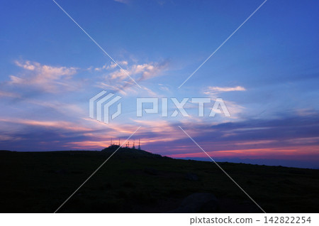 The beautiful sunset over Utsukushigahara and the silhouette of the radio tower. The beautiful sunset over Utsukushigahara and the silhouette of the radio tower. 142822254