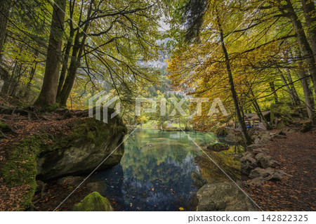 Blausee Switzerland, nature landscape at blue lake in autumn season Blausee Switzerland, nature landscape at blue lake in autumn season 142822325