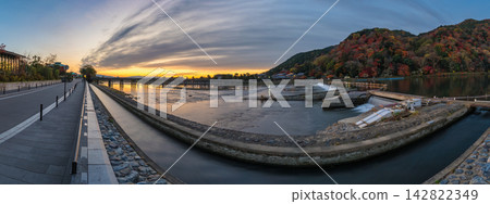Arashiyama Kyoto Japan, panorama sunrise at Katsura river and Togetsukyo Bridge in autumn season Arashiyama Kyoto Japan, panorama sunrise at Katsura river and Togetsukyo Bridge in autumn season 142822349