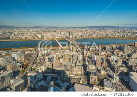 Osaka Japan, city skyline high angle view at Yodo River Osaka Japan, city skyline high angle view at Yodo River 142822366