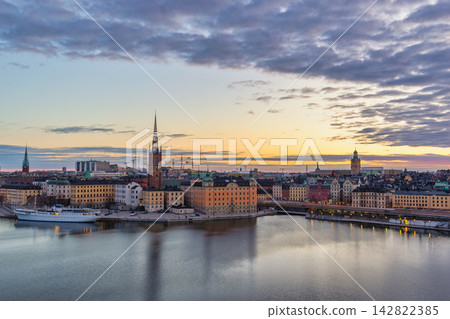 Stockholm Sweden, sunrise city skyline at Stockholm City Hall and Gamla Stan Stockholm Sweden, sunrise city skyline at Stockholm City Hall and Gamla Stan 142822385