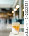 Glass of milk latte coffee on a table. 142822524
