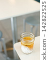 Glass of milk latte coffee on a table. 142822525