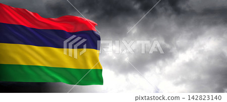 Mauritius Flag Waving Against Dark Cloudy Sky Mauritius Flag Waving Against Dark Cloudy Sky 142823140