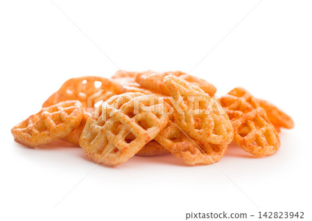 Close-Up Of Seasoned Waffle-Style Potato Chips Crispy Savory Snack On White Background Close-Up Of Seasoned Waffle-Style Potato Chips Crispy Savory Snack On White Background 142823942