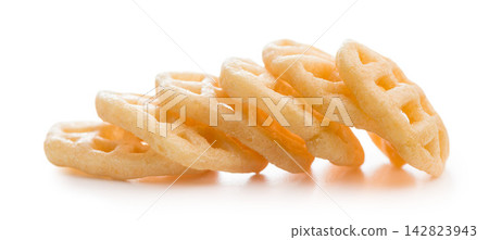 Golden Waffle Potato Snacks Stacked On White Background Closeup Crisp Fried Snack Food Golden Waffle Potato Snacks Stacked On White Background Closeup Crisp Fried Snack Food 142823943