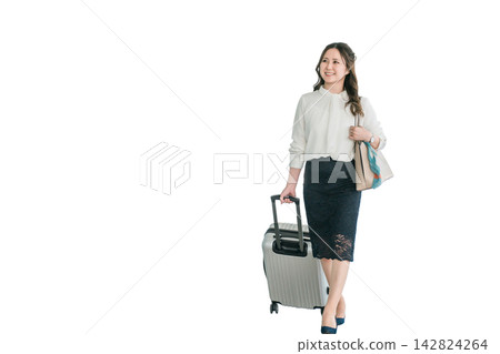 Business woman walking with a suitcase Business woman walking with a suitcase 142824264