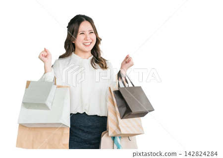 Businesswomen/women who relieve stress by shopping Businesswomen/women who relieve stress by shopping 142824284